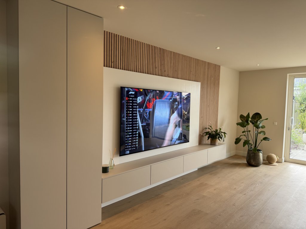Bespoke cinewall: stylish transformation of this living room